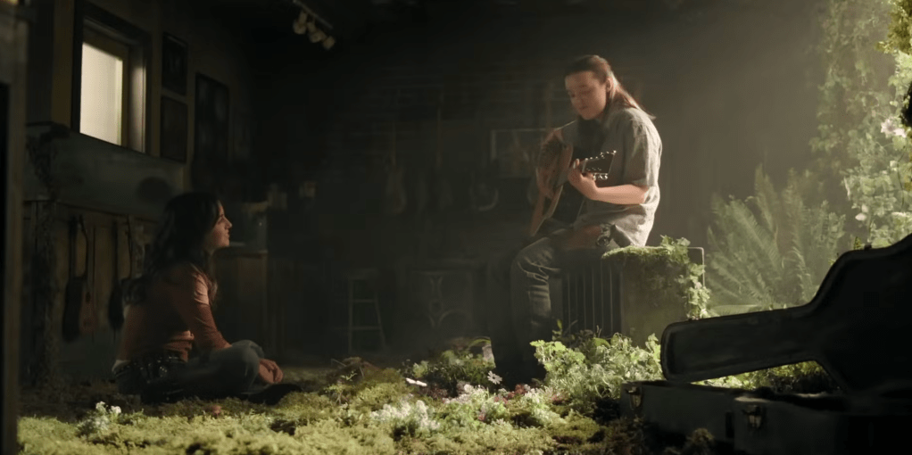 Contra o ódio, The Last Of Us insiste em amar: Por que importa a história de Ellie e Dina?

Dina escuta Ellie à guitarra.
